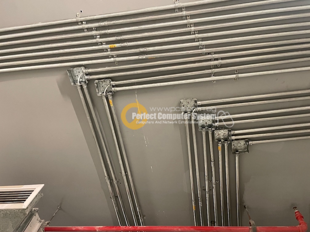 Electrical conduits installed across a ceiling